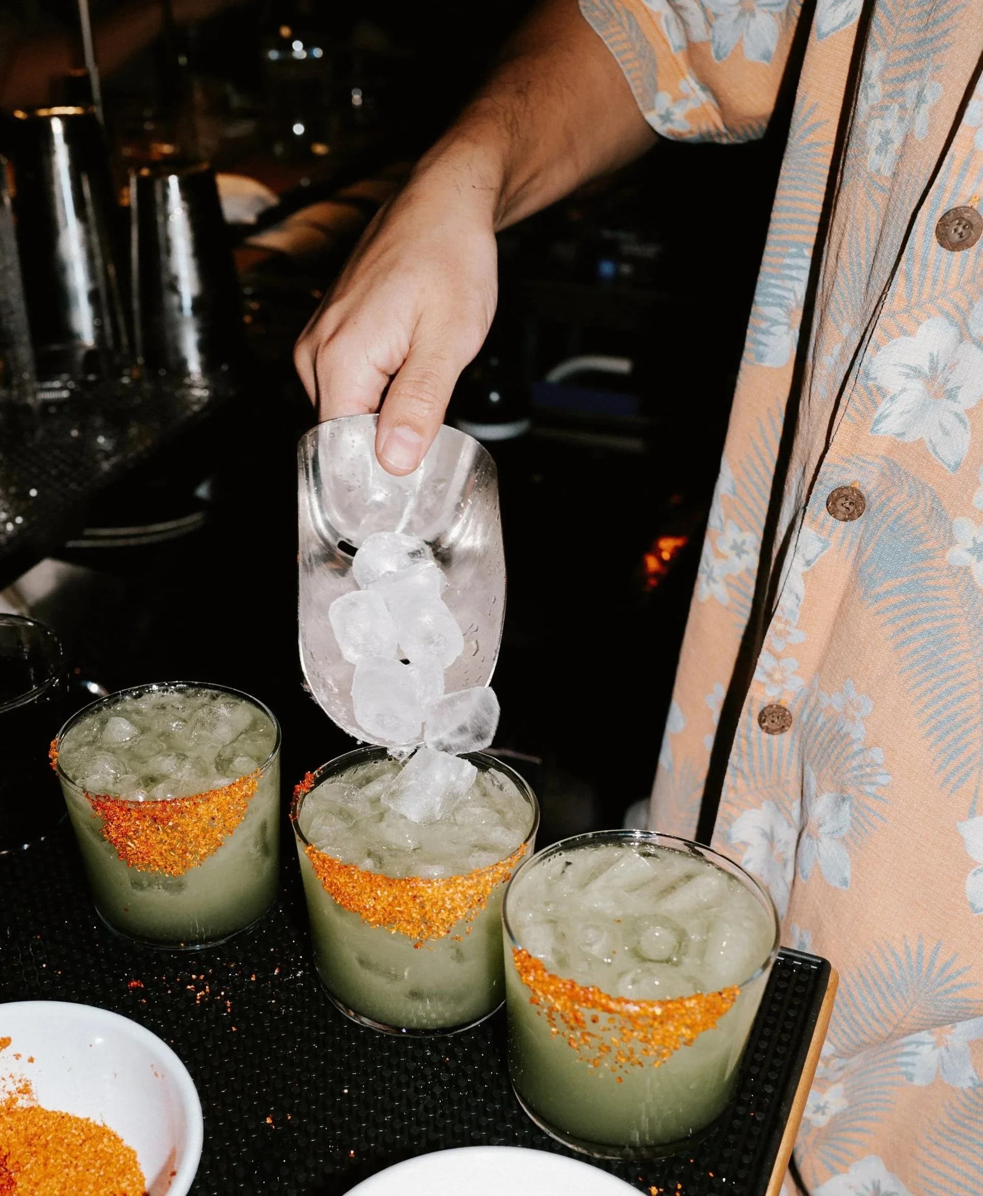 Guests gathered around a long table at a Sun Rice celebration